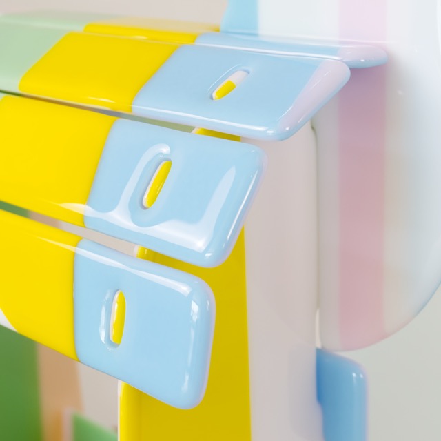 Close-up of the pale blue interlocking bracket joints on the rocking horse